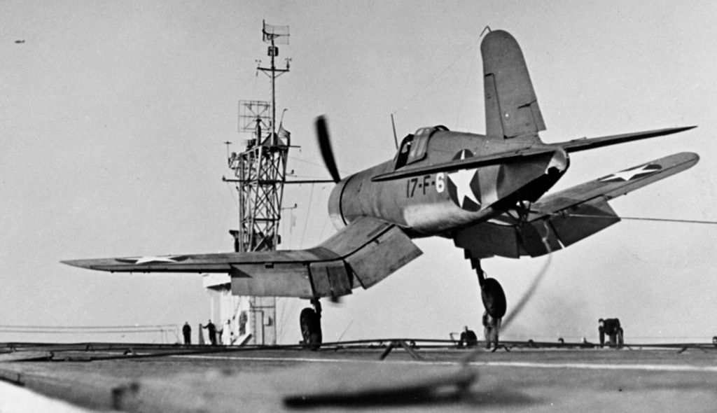 F4U-1_VF-17_landing_on_USS_Charger_CVE-3